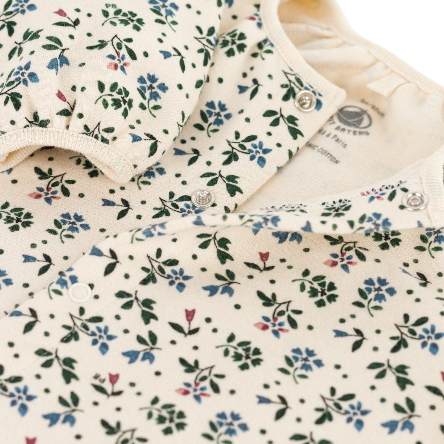 Petit Bateau Langarm Overall beige mit grün/blau/roten Blumen Bodysuit Petit Bateau