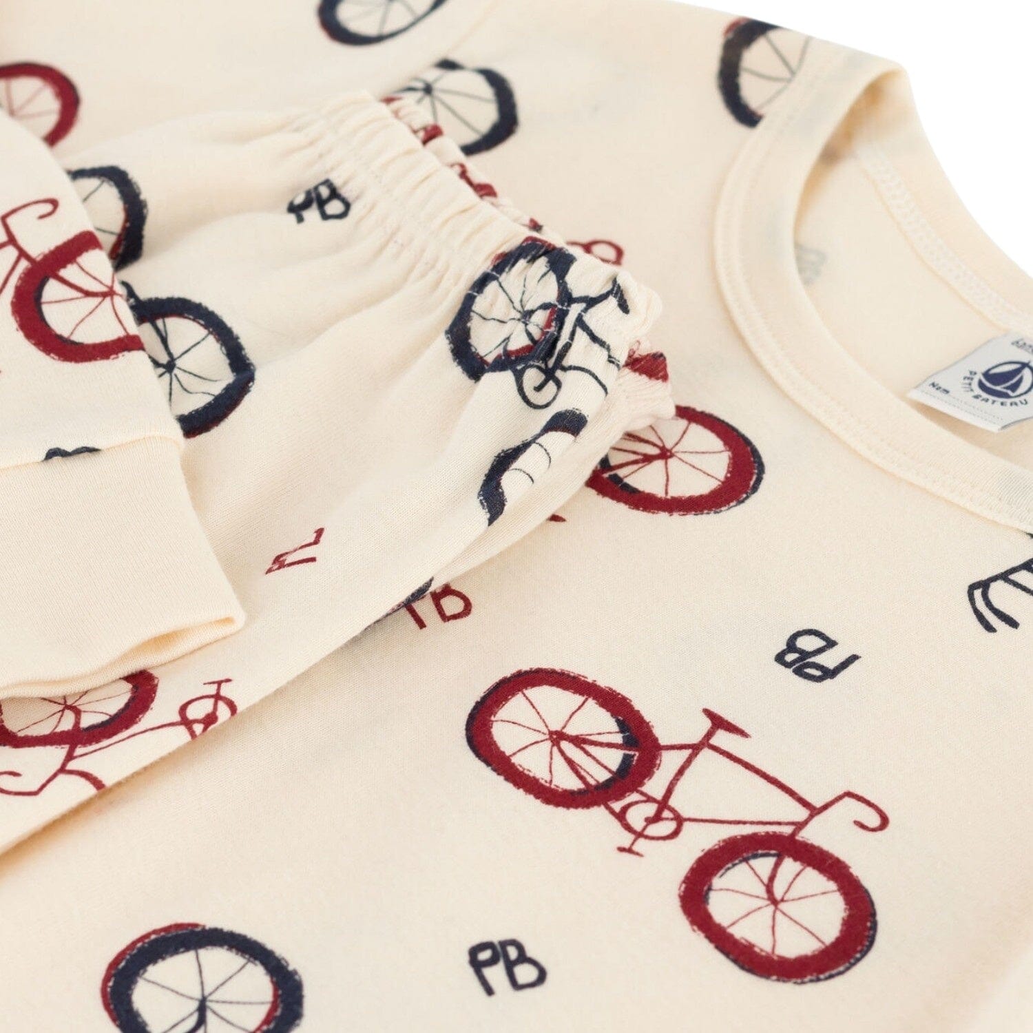 Petit Bateau Pyjama creme bunte Fahrräder aus Baumwolle Schlafanzug Petit Bateau