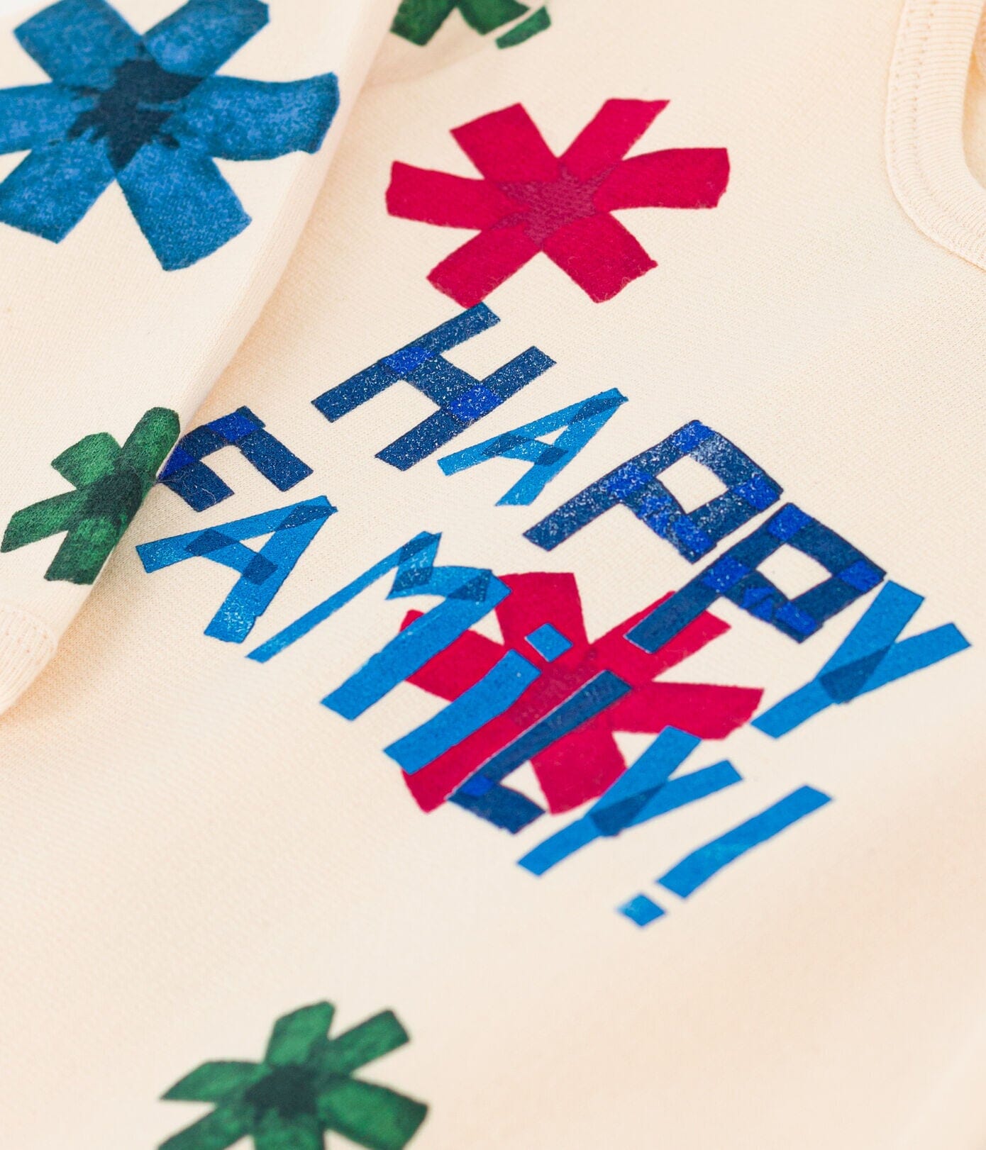 Petit Bateau Strampler mit blauen, roten und grünen Sternen Strampler Petit Bateau