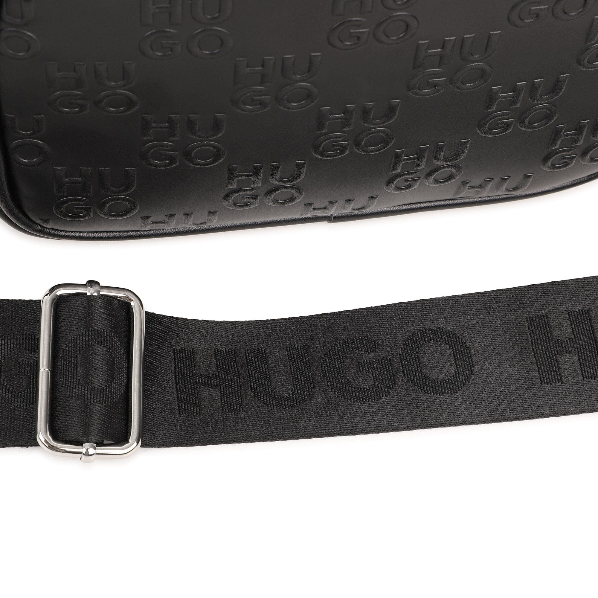 HUGO Umhängetasche Schwarz Allover-Logo Prägung Mini Me Umhängetaschen HUGO 